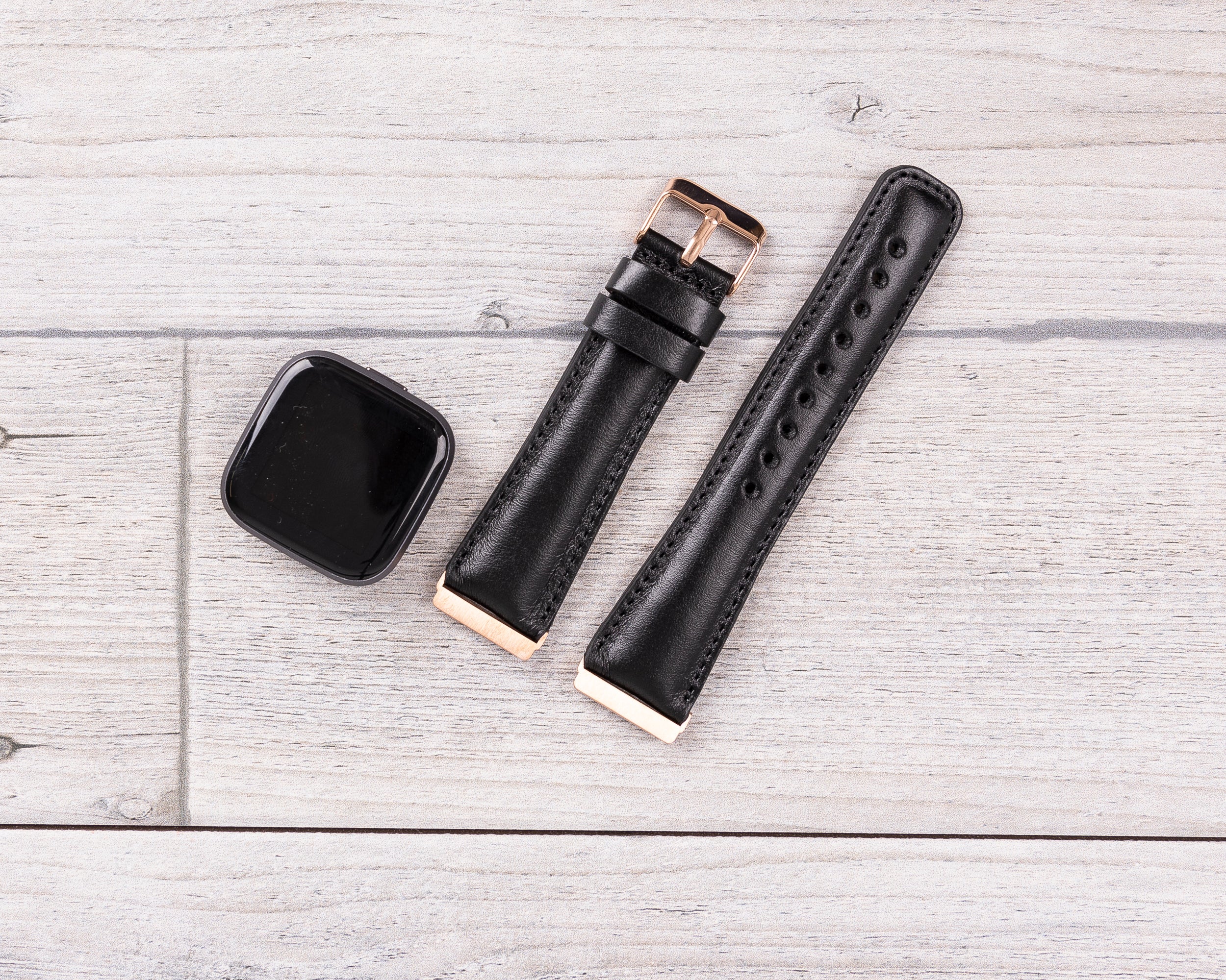 Schwarzes klassisches Fitbit-Uhrenarmband aus Leder 